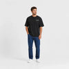 T-shirt Alpine A110 noir vu de face en plan large avec logo Tourismo