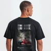 T-shirt noir Spa Grand Prix, gros plan sur le design Eau Rouge avec monoplace rouge sur le circuit