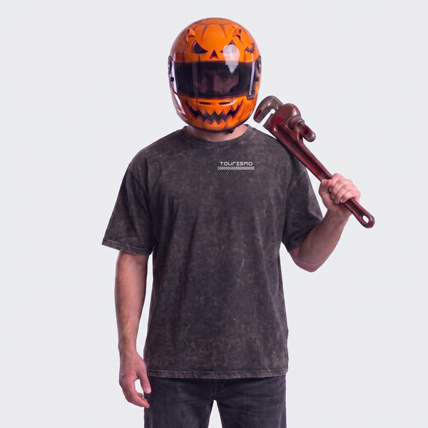 The Ghost RS washed black T-shirt worn from the front with the Tourismo logo