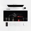 Mousepad Porsche 930 Turbo, sobre uma mesa clara com computador, teclado e mouse