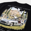 T-shirt noir oversize Tourismo Clothing porté avec logo poitrine blanc