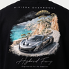 Gros plan print dos t-shirt noir Riviera Overboost avec McLaren P1 et crique turquoise